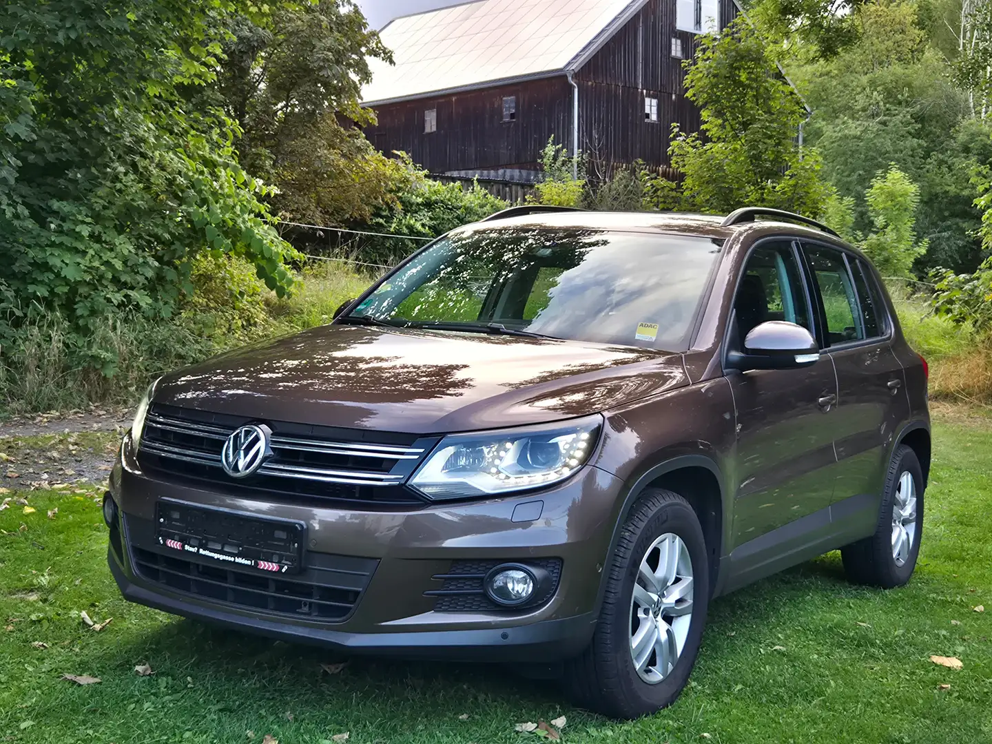 Volkswagen Tiguan Trend & Fun 4Motion*DSG*NAVI*AHK*1.Hd*SCHECKHEFT* Bruin - 1