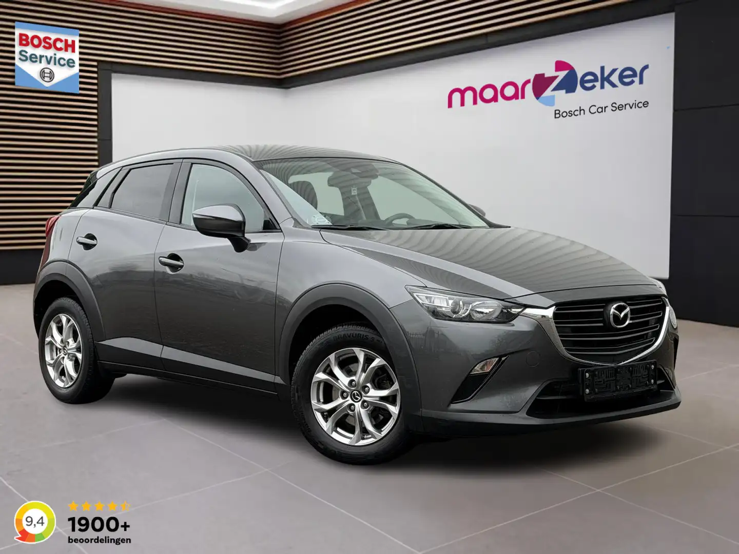 Mazda CX-3 2.0 SkyActiv-G 121pk ✅Navi✅Stoelverwarm.✅Camera✅Cl Gris - 1