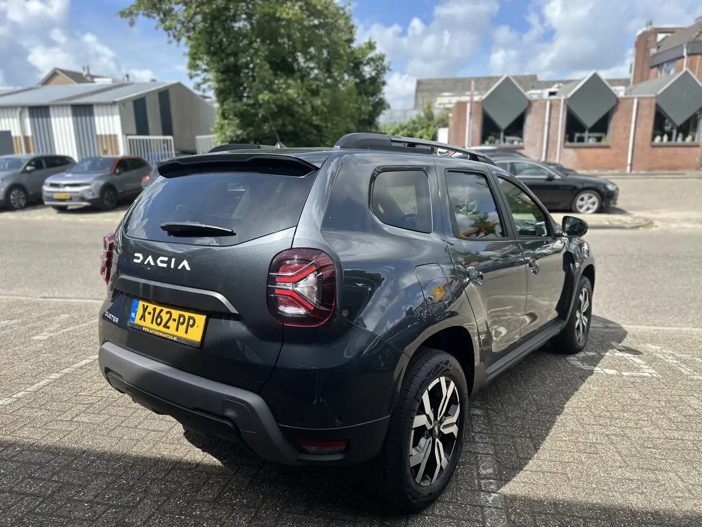 Dacia Duster 1.3 TCe 150 Journey Automaat/Camera V+A/ Stoelverw Grijs - 2