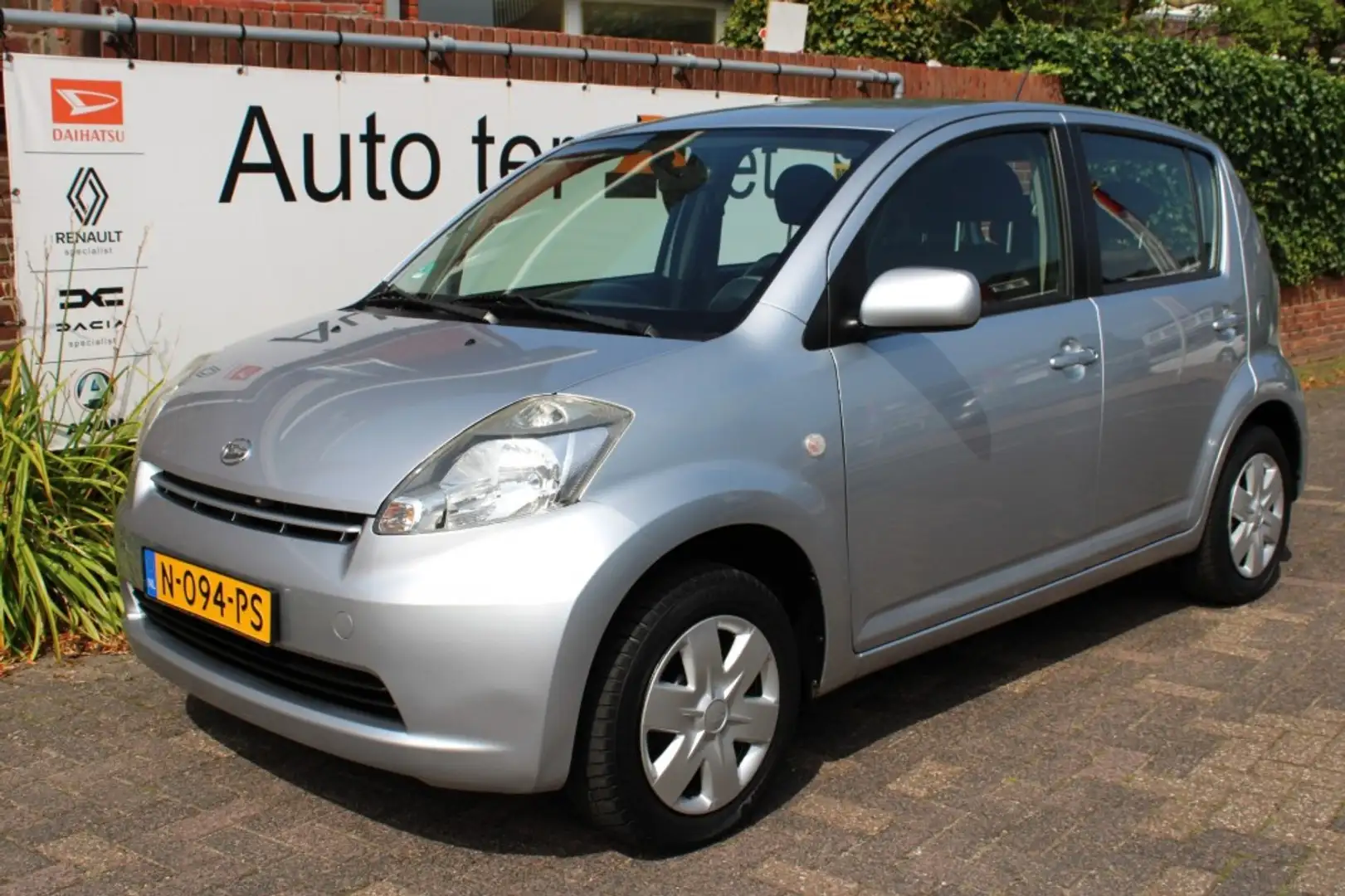 Daihatsu Sirion 1/0 12V Premium airco Gris - 1