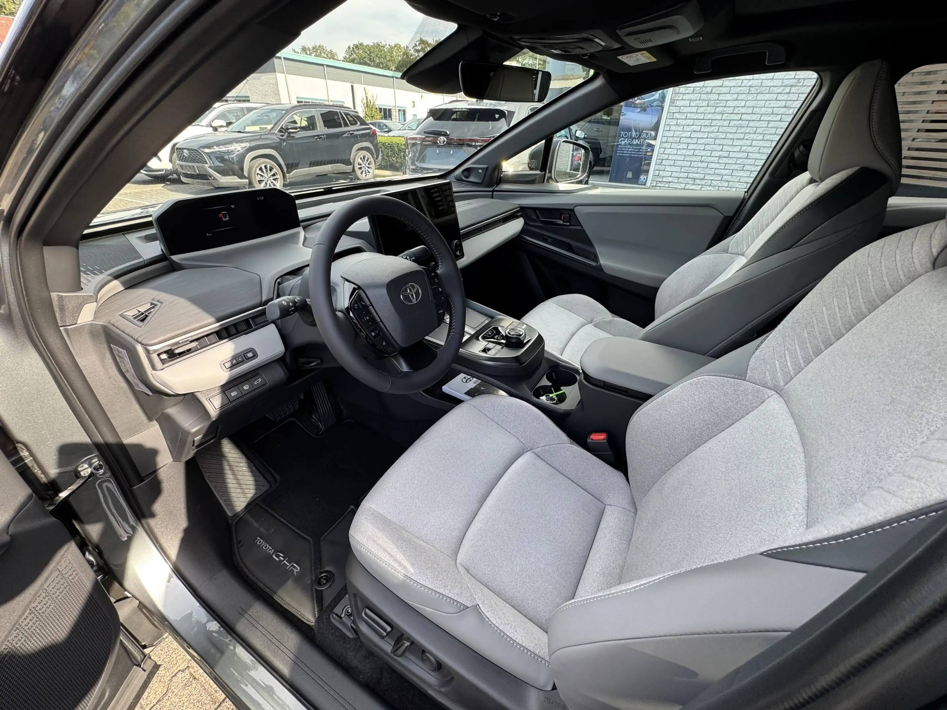 Toyota C-HR+ EXECUTIVE AWD 77 kWh NIEUW DIRECT LEVERBAAR! PANOD — photo 11