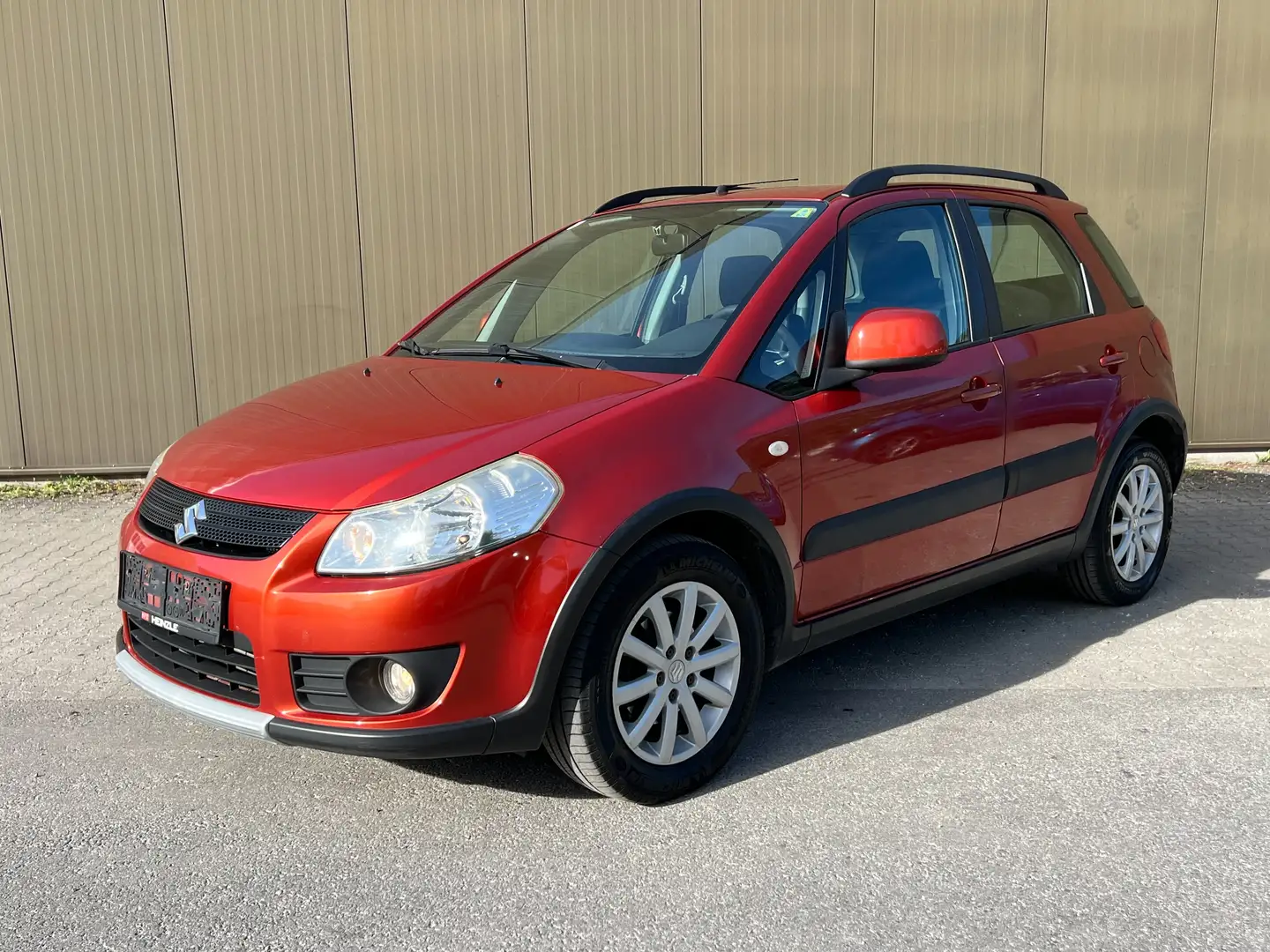 Suzuki SX4 1,9 DDiS 4WD Klima PDC AHK* Orange - 1