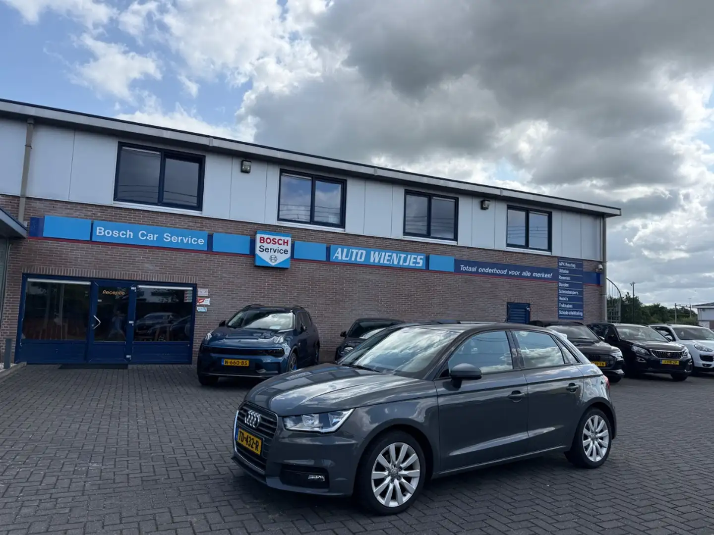 Audi A1 Sportback 1.0 TFSI | Sport Pro Line | Airco | Crui Grijs - 2