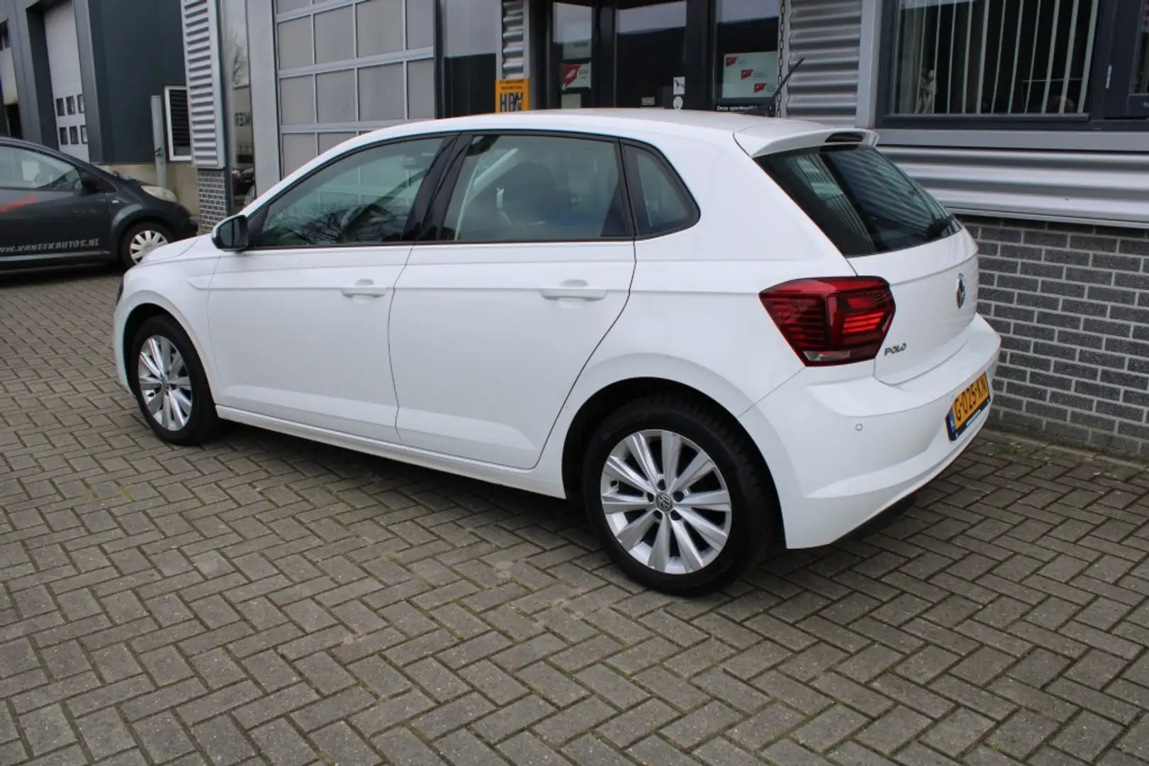 Volkswagen Polo 1.0 TSI High Line AIRCO CRUISE ACC NAVI STOELVERWA Blanco - 2