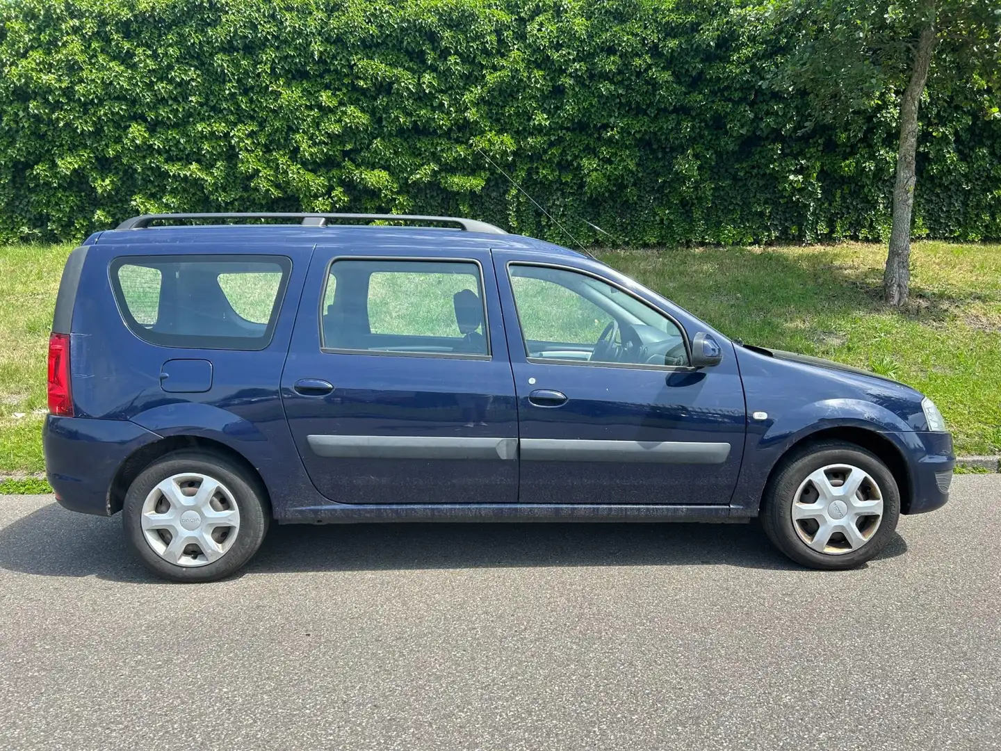 Dacia Logan MCV 1.6 MPI Lauréate - gebruikersschade rondom Blauw - 2