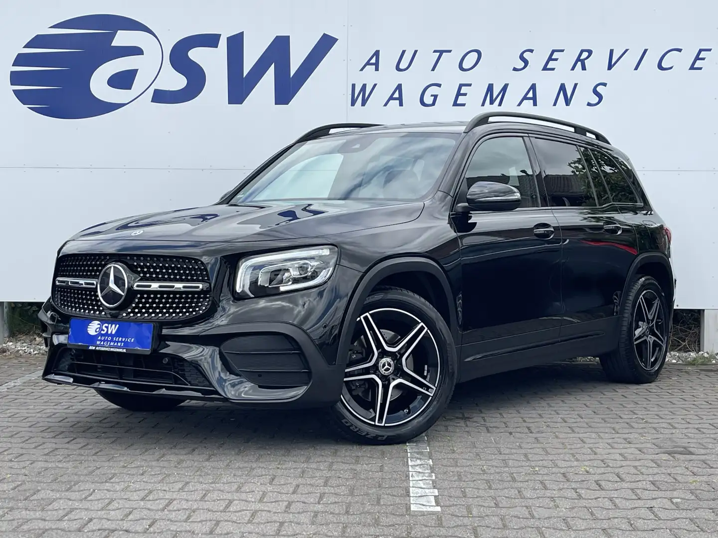 Mercedes-Benz GLB 200 Business Solution AMG | Trekhaak | Ambient Light | Zwart - 1