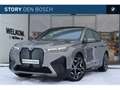 BMW iX xDrive40 Sport / Panoramadak / Trekhaak / Stoelven Grau - thumbnail 1