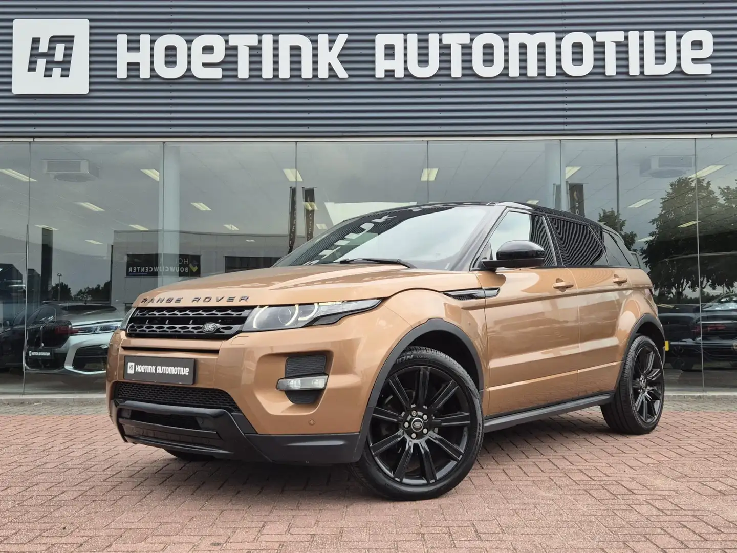 Land Rover Range Rover Evoque 2.0 Si 4WD Prestige | Pano | Meridian | Memory| St Bruin - 1