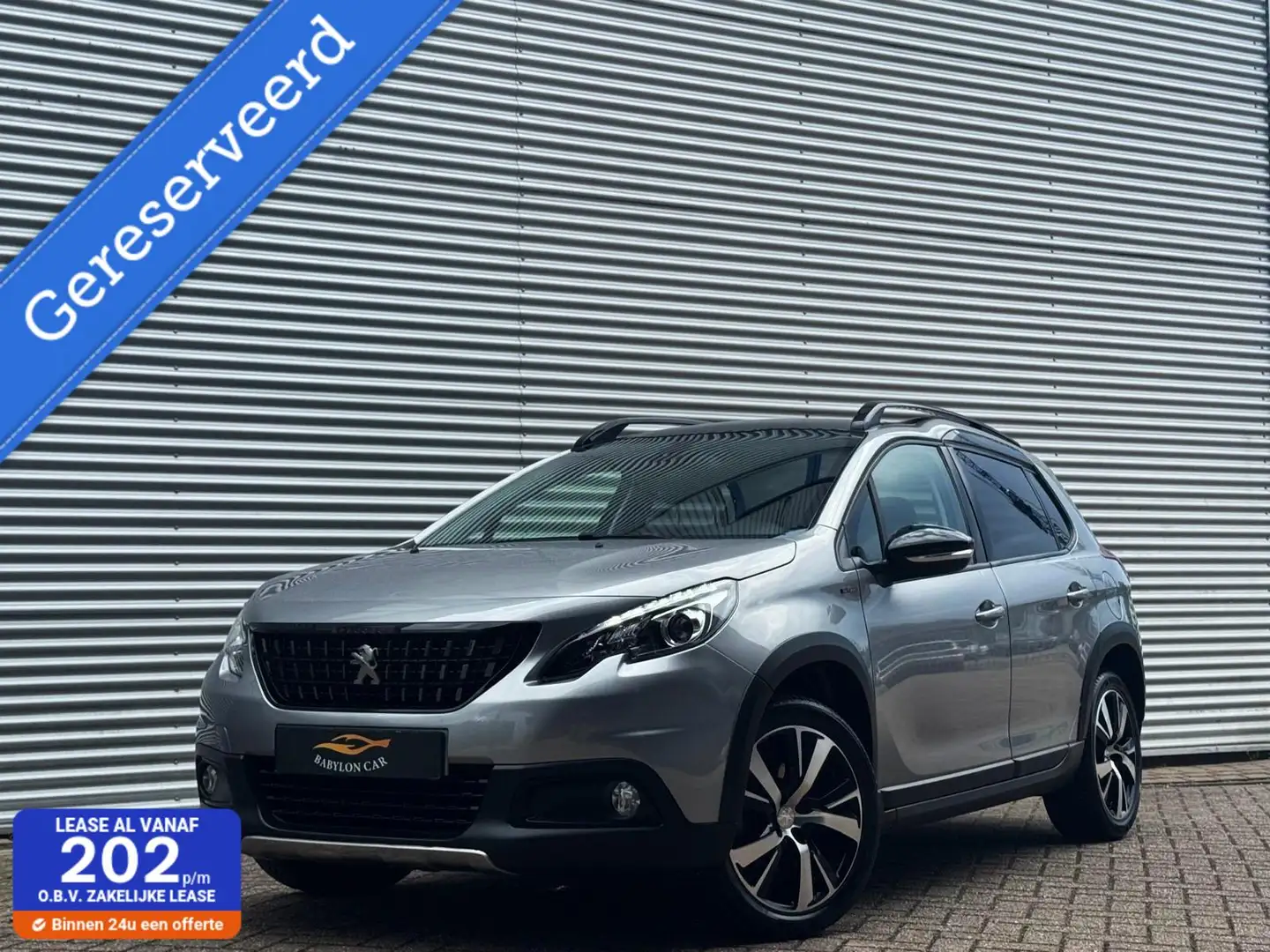 Peugeot 2008 1.2 e-THP GT Line/Aut/Camera/Led/Pano/Apple Carpla Grijs - 1