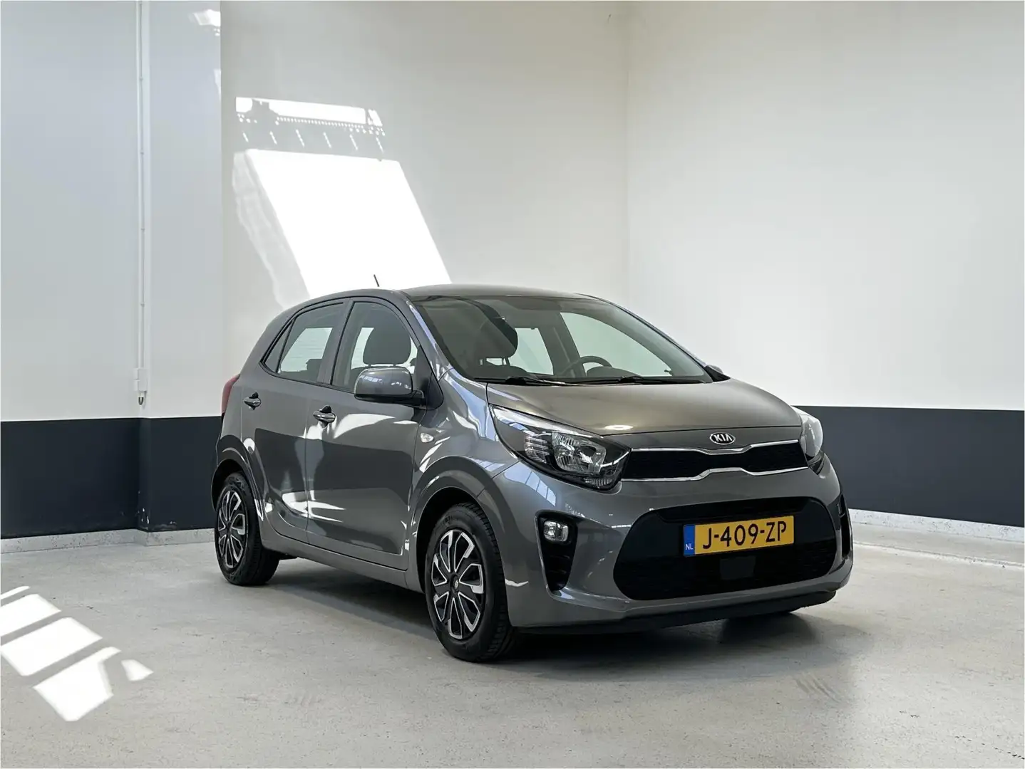Kia Picanto 1.0 DPi ComfortLine | NL | 1e Eig | Airco | Cruise Grijs - 1