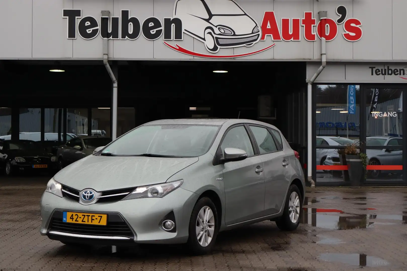 Toyota Auris 1.8 Hybrid Aspiration Navigatie, Camera, Airco, Cl Gris - 1