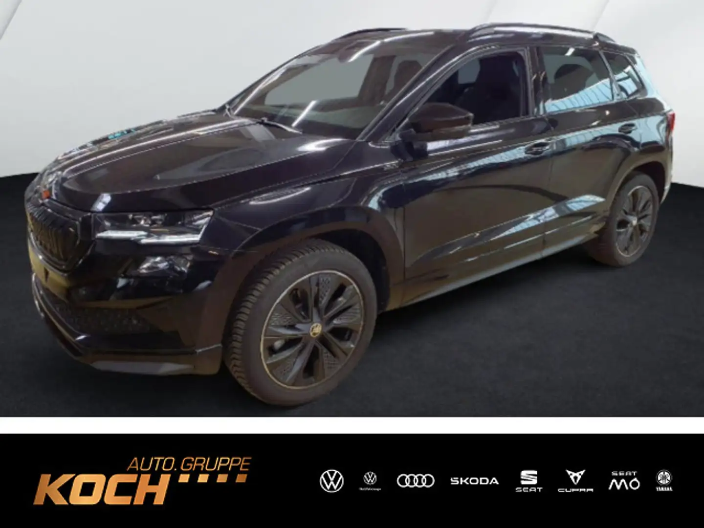 Skoda Karoq Sportline 2.0 TSI DSG 4x4 *NAVI*PANODACH* Zwart - 1