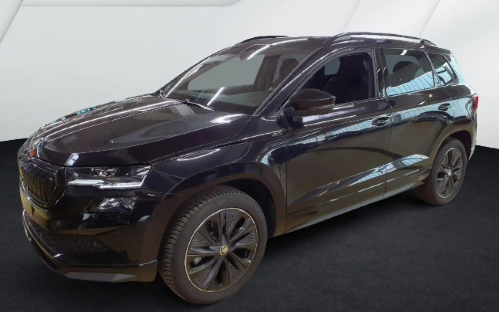 Skoda Karoq Sportline 2.0 TSI DSG 4x4 *NAVI*PANODACH* Zwart - 2