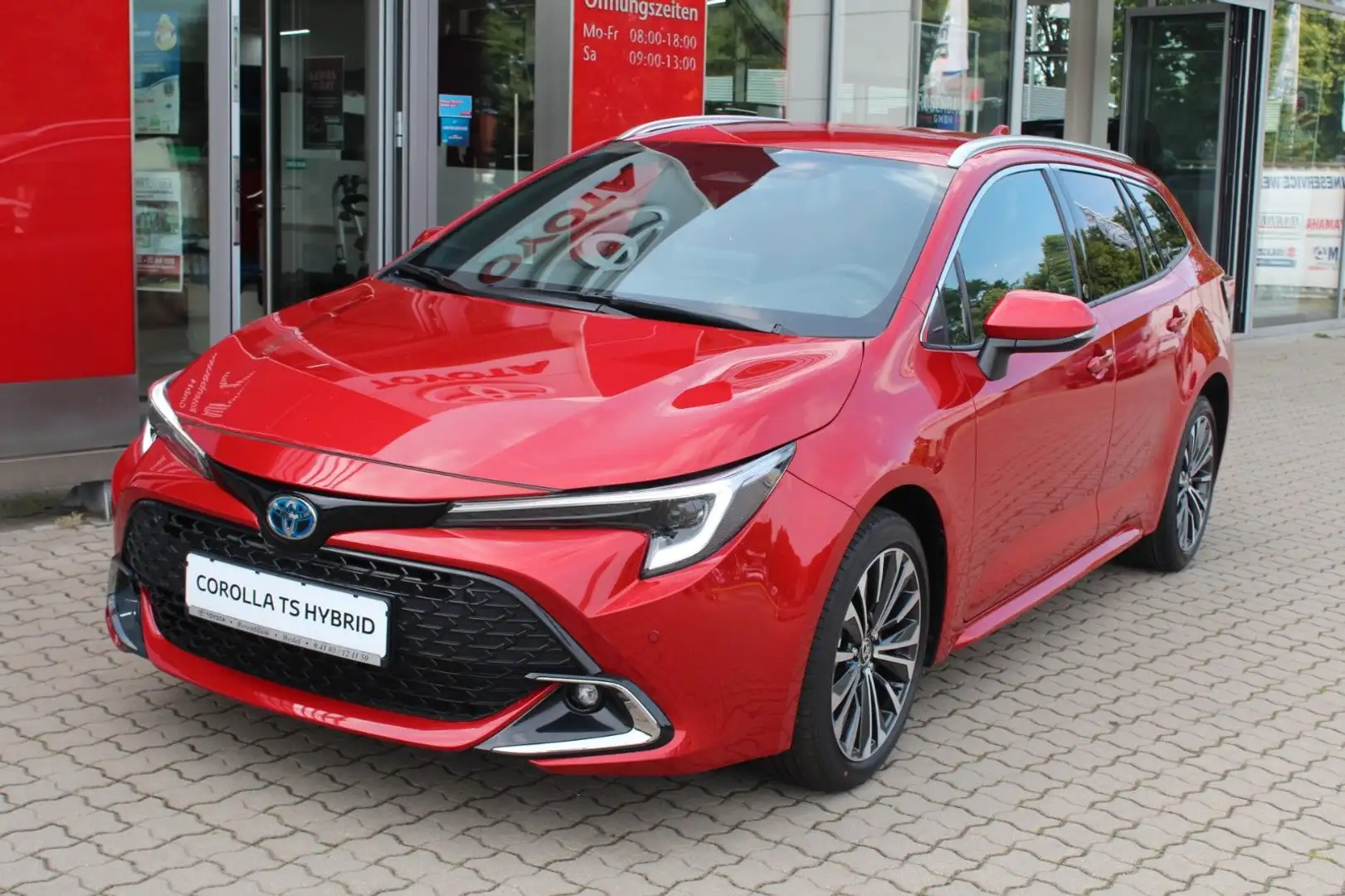 Toyota Corolla Touring Sports 1.8 Hybrid Team D*LED*PDC Rood - 1