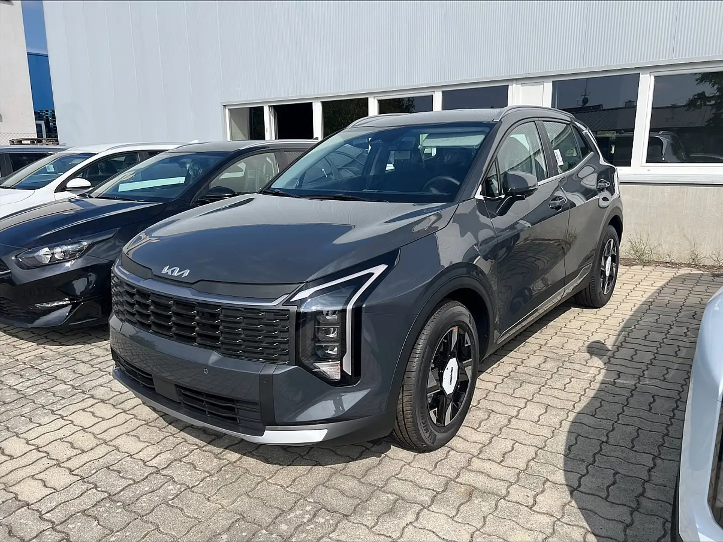 Kia Sportage 1,6 TGDI Titan Facelift Grau - 1