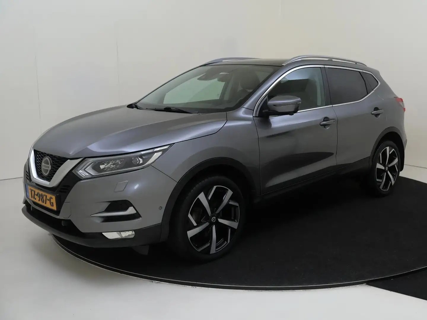 Nissan Qashqai 1.2 Tekna | Panoramadak | 360 Camera | Stoelverwar Grijs - 1