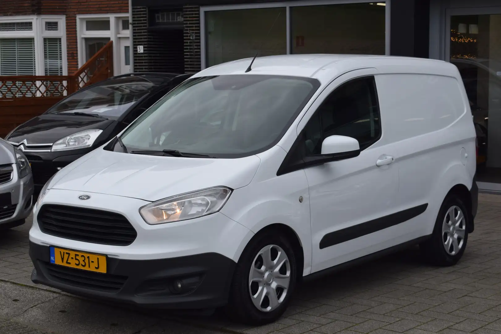 Ford Transit Courier 1.5 TDCI Trend Airco Cruise PDC Navi NAP Wit - 2