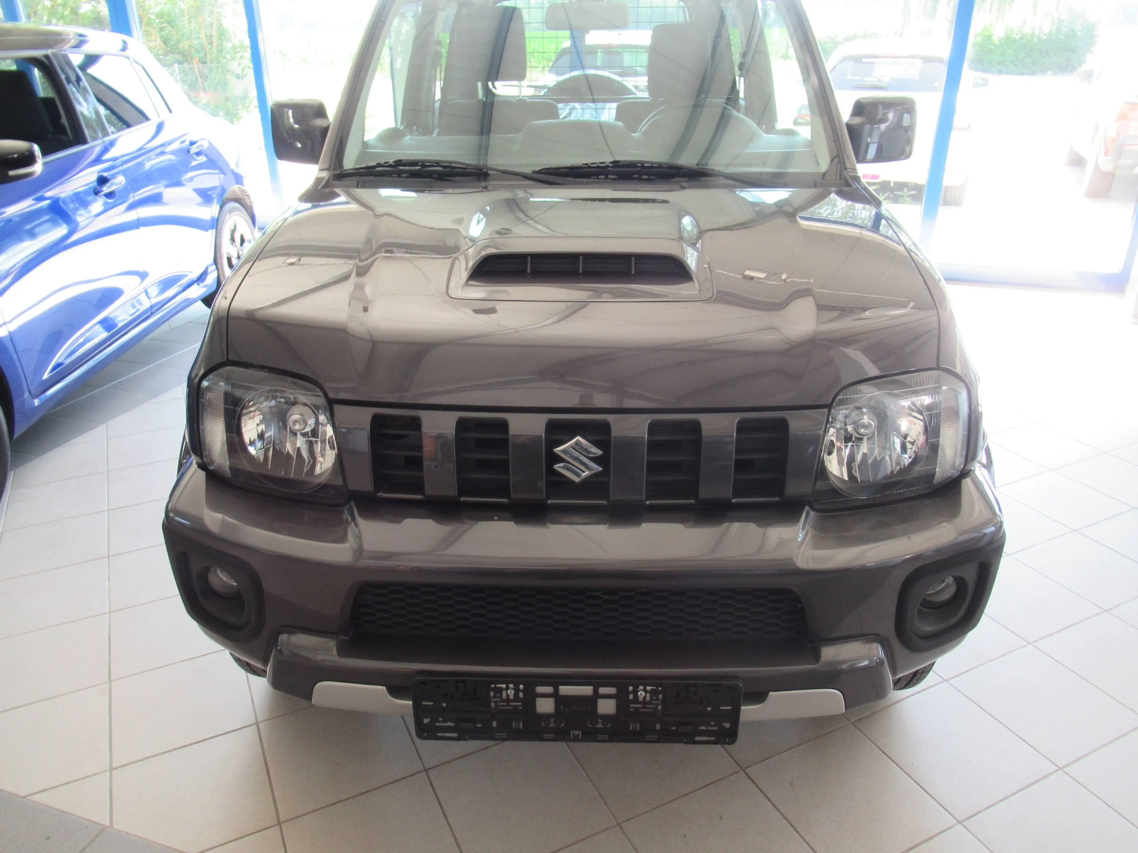 Suzuki Jimny Jimny Comfort / TOP / 4 Sitzer / Trenngitter / Wildwanne — photo 2