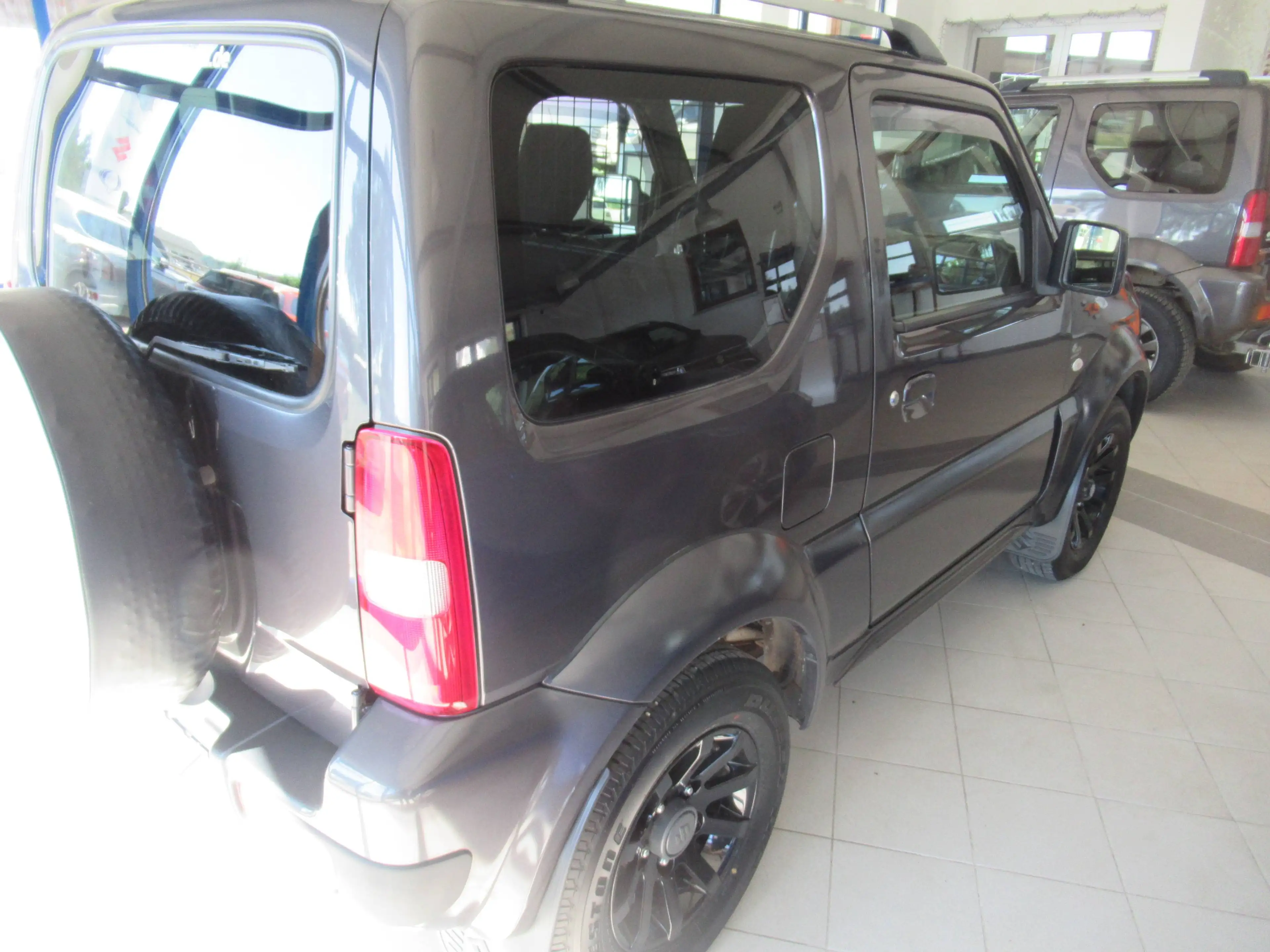 Suzuki Jimny Jimny Comfort / TOP / 4 Sitzer / Trenngitter / Wildwanne — photo 8