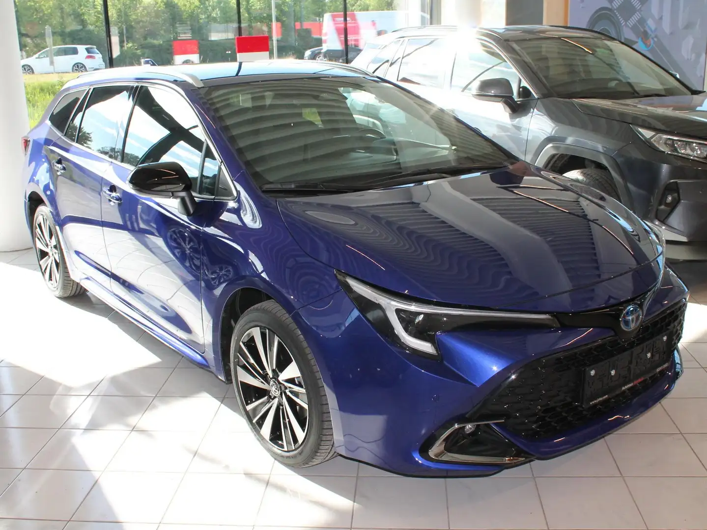 Toyota Corolla Corolla 1,8 Hybrid Touring Sports Teamplayer Blau - 1