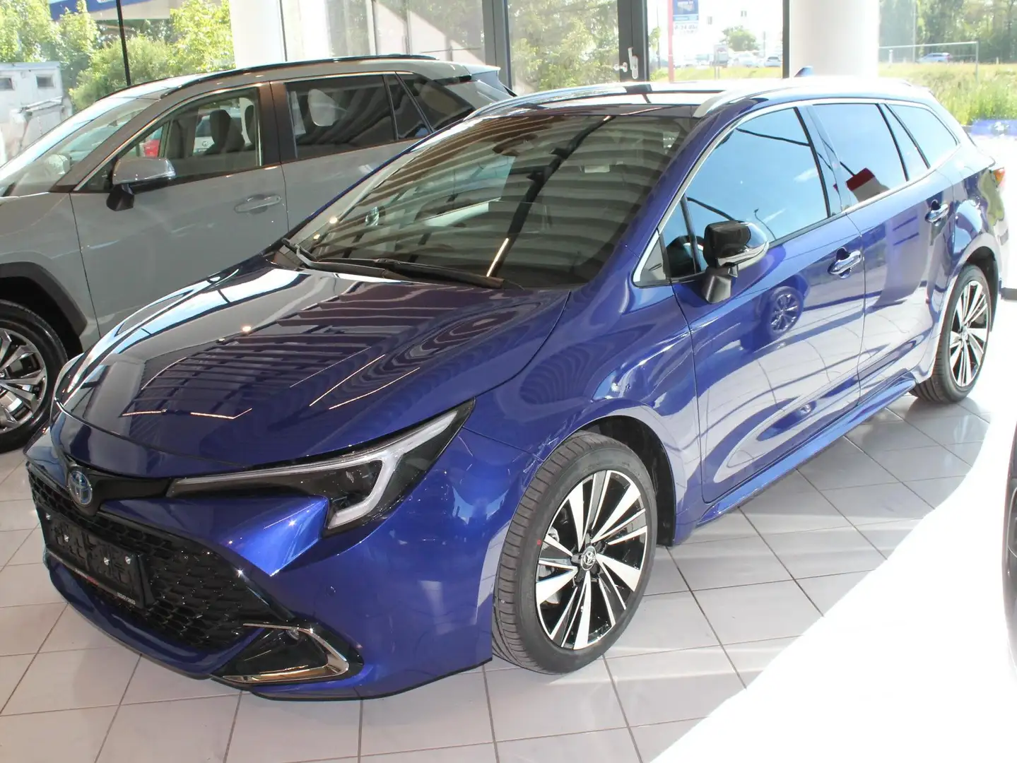 Toyota Corolla Corolla 1,8 Hybrid Touring Sports Teamplayer Blau - 1