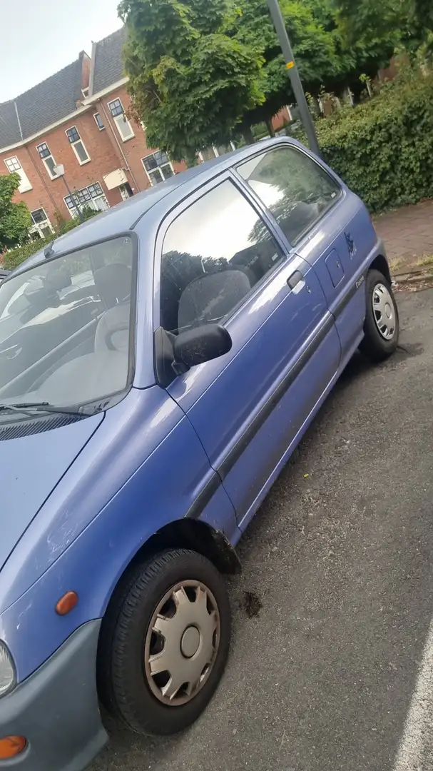 Daihatsu Cuore AUTOMAAT 0.8 liter komt uit  1995 met apk 	19-03-2 Blauw - 2
