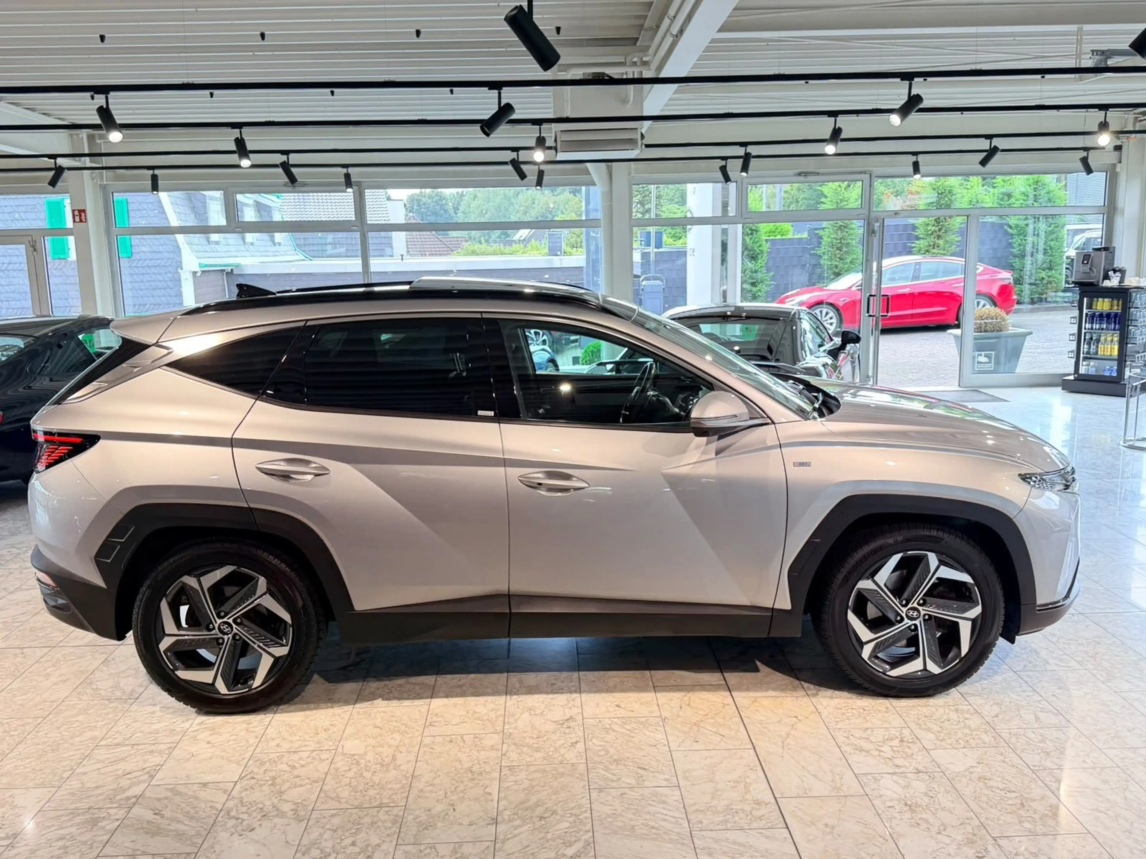 Hyundai TUCSON Prime 4WD PANO*19"*LEDER*DCT*19"*360°*AHK — photo 5