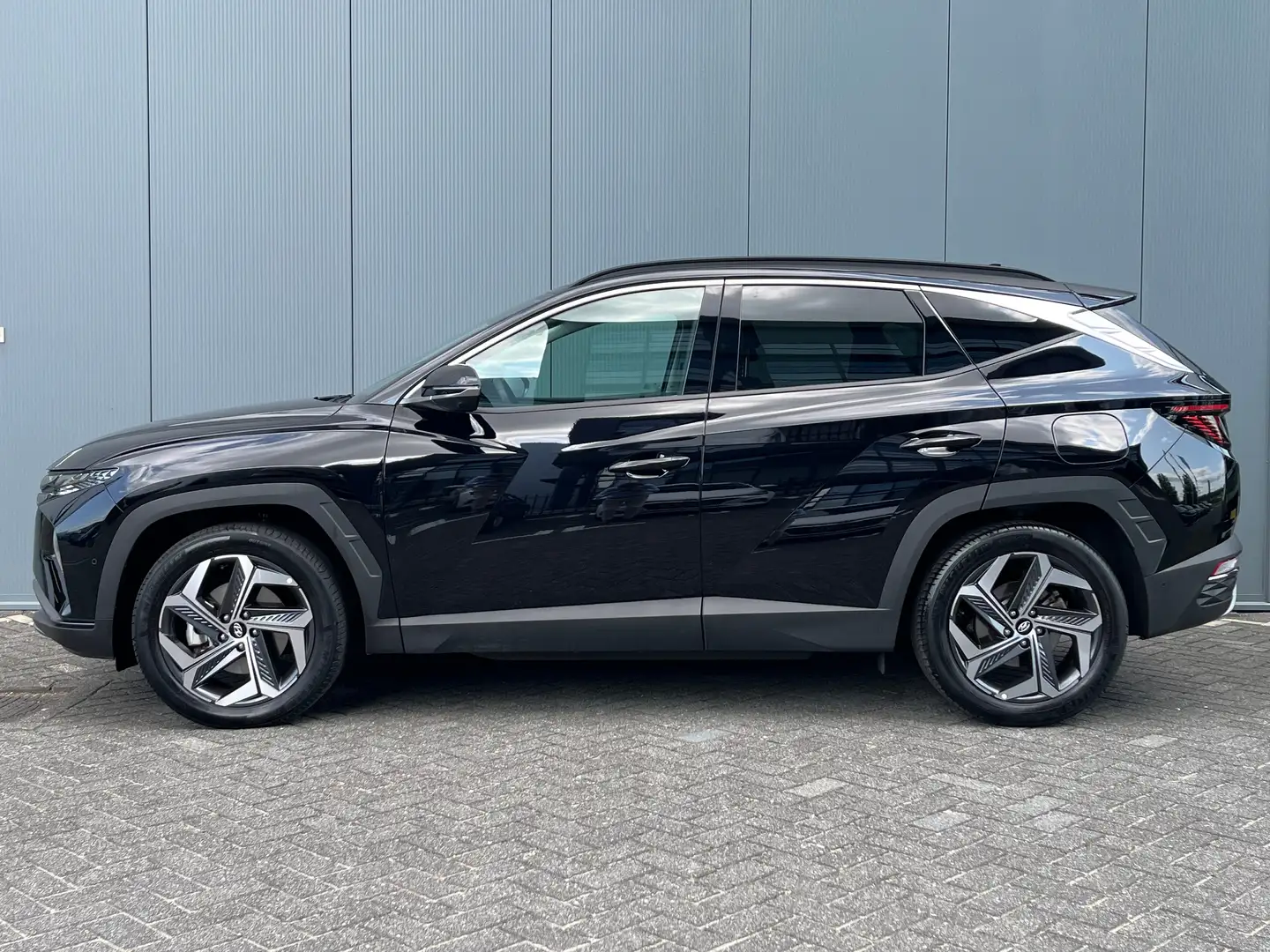 Hyundai TUCSON 1.6 T-GDI 265pk PHEV Premium 4WD (299,- p/m Demo D Noir - 2