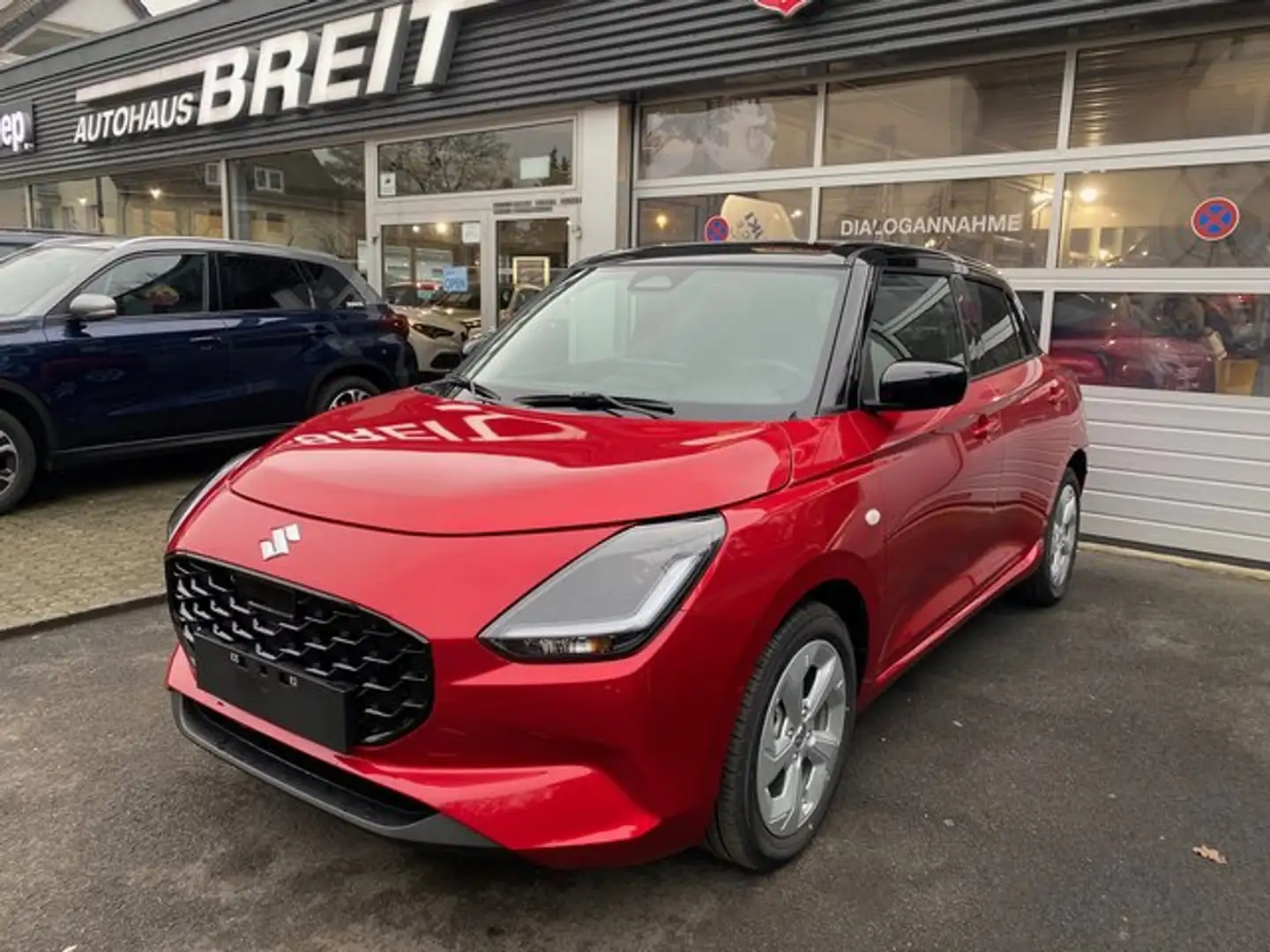 Suzuki Swift 1.2 Dualjet Hybrid 61 kW Comfort Rood - 1