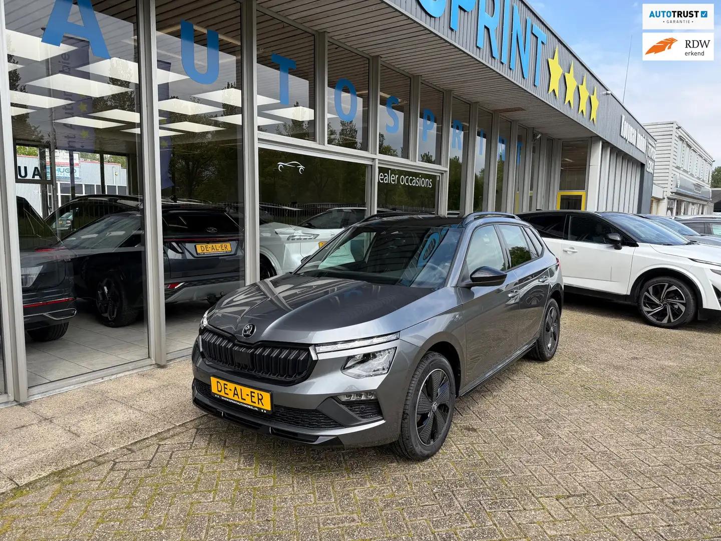Skoda Kamiq 1.5 TSI Monte Carlo 150PK PANO , ELEKTRISCHE ACHTE Grijs - 1