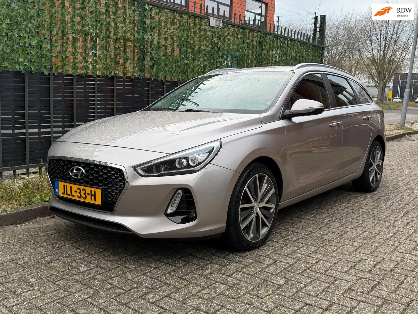 Hyundai i30 Wagon 1.0 T-GDI Premium AIRCO|CRUISE|CAMERA|APK Gris - 1