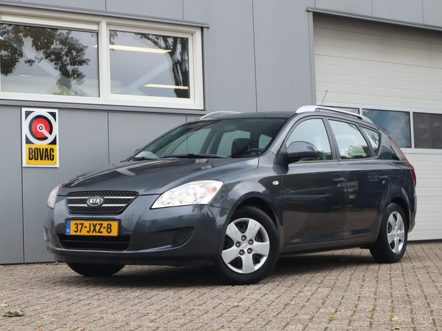 Kia Ceed / cee'd Sporty Wagon 1.4 X-tra ISG Grijs - 1