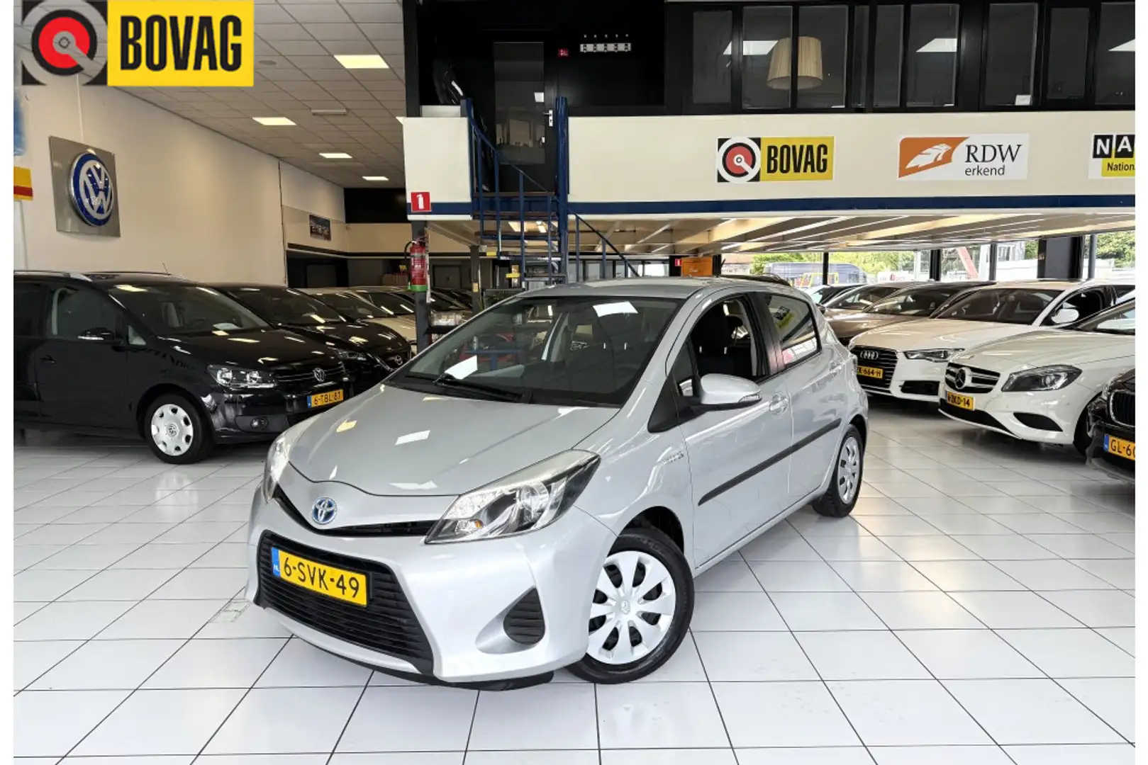 Toyota Yaris 1.5 Full Hybrid Asp Bovag Garantie Grijs - 1