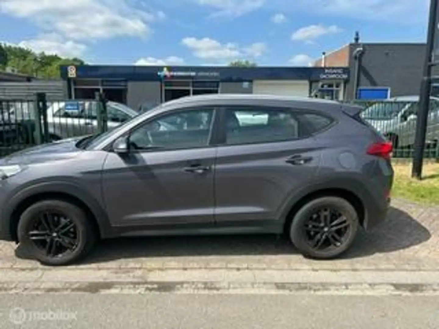Hyundai TUCSON 1.6 GDi i-Motion IN GEBRUIK TOT 09-2025 Grijs - 2