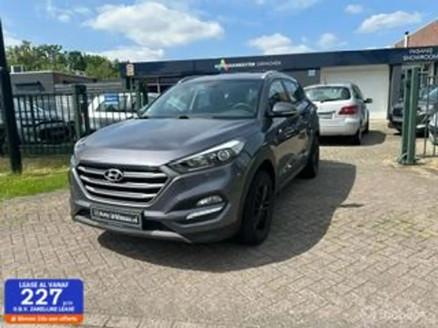 Hyundai TUCSON 1.6 GDi i-Motion IN GEBRUIK TOT 09-2025 Grijs - 1