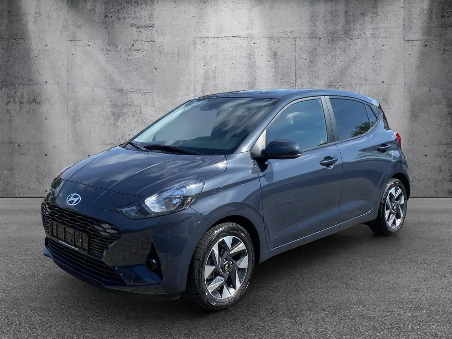 Hyundai i10 Automatik Navi / R.Kamera / Winterp. / Alu Grijs - 1