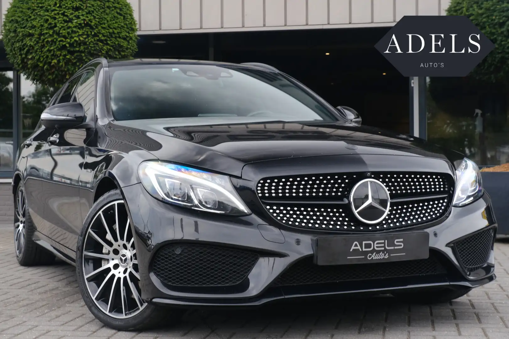 Mercedes-Benz C 450 Estate AMG 4MATIC Pano HUD Standkachel Distronic P Zwart - 1