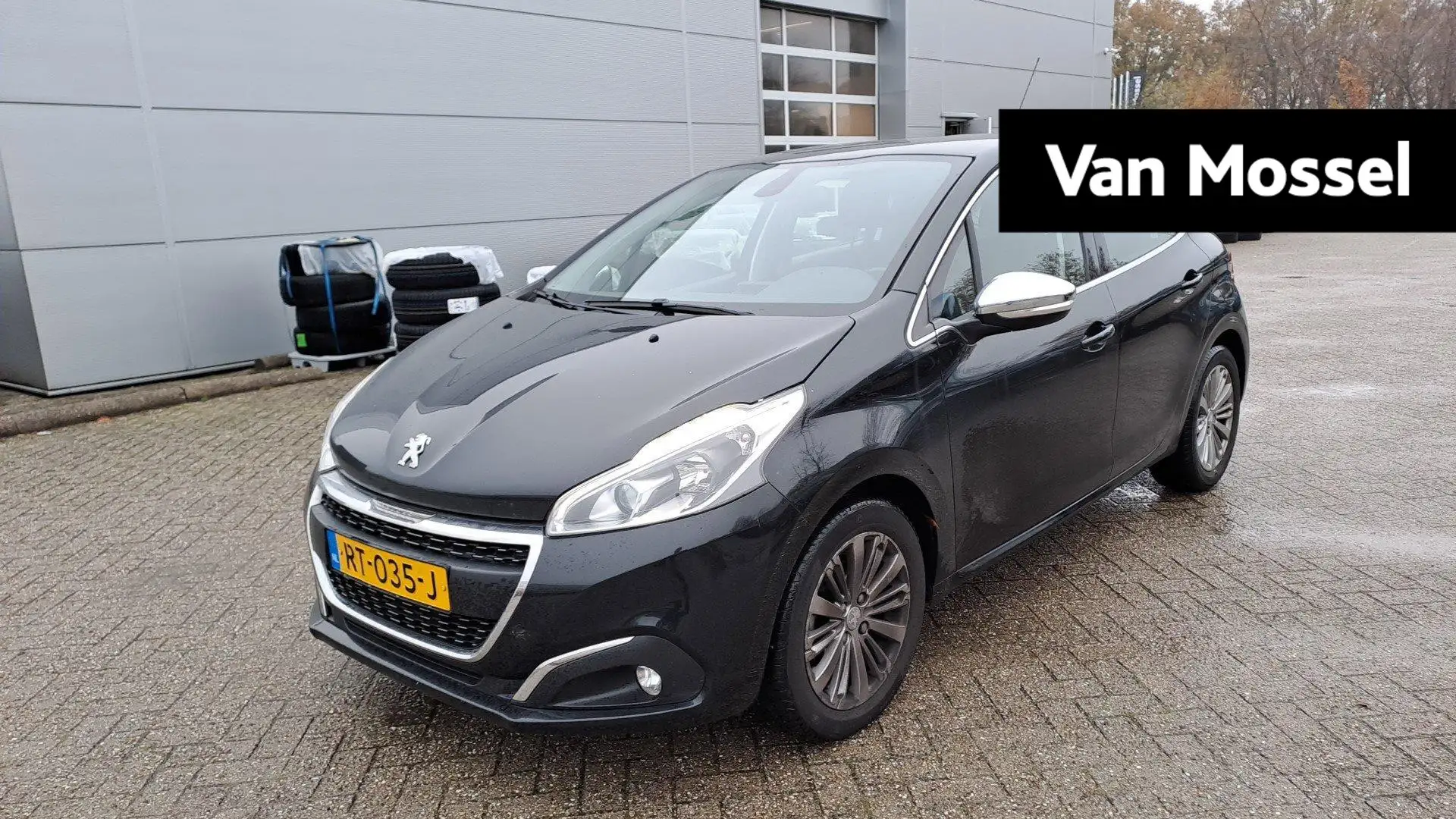 Peugeot 208 1.2 PureTech Allure | Parkeersensoren | Camera | C Zwart - 1