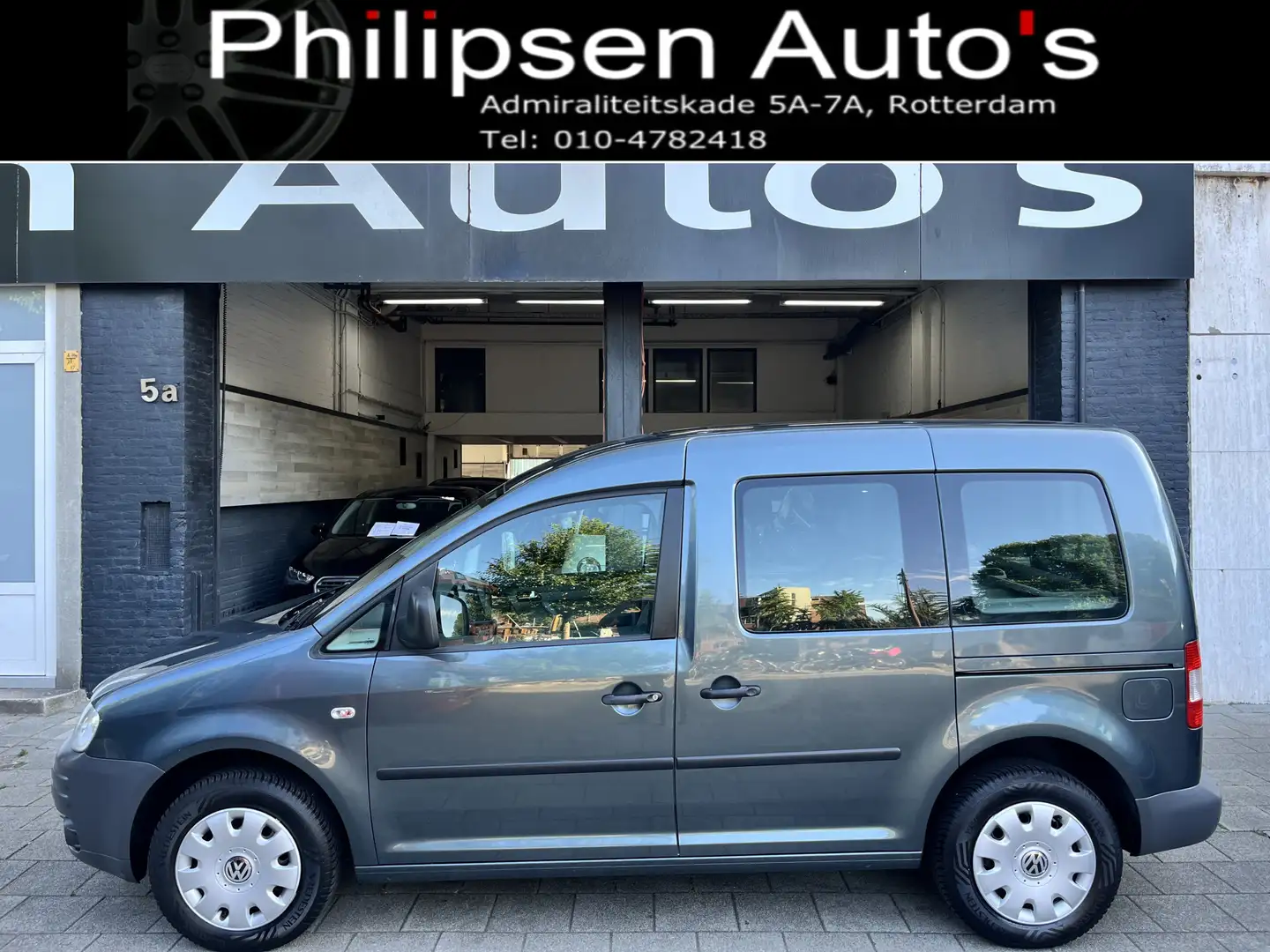 Volkswagen Caddy 1.6 Optive Comfort 5p. Grijs - 1