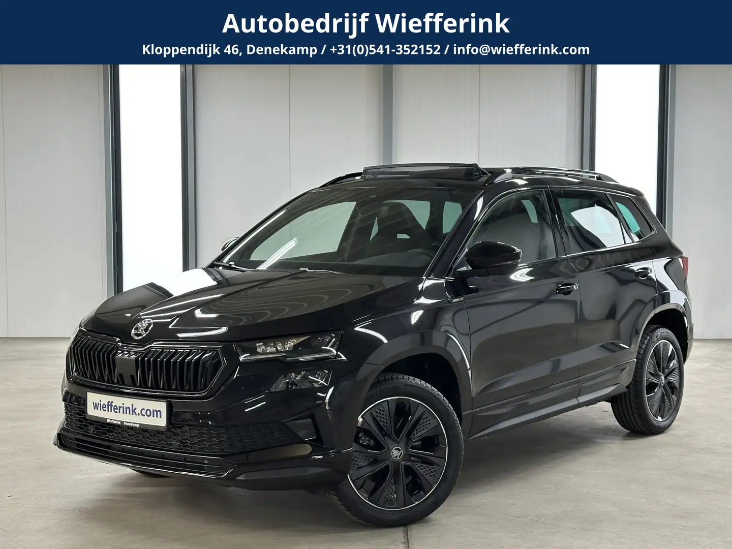 Skoda Karoq 1.5 TSI 150pk ACT Sportline Business | Elek. Trekh Schwarz - 1