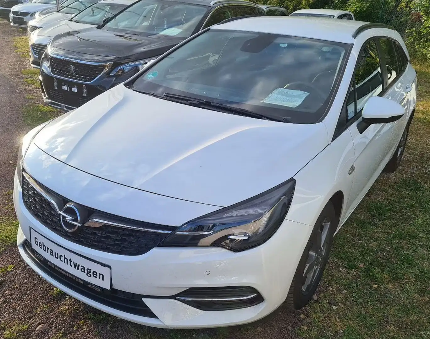 Opel Astra K Sports Tourer NAVI/KAMERA/SHZ/LRH/PDC/AH Weiß - 1