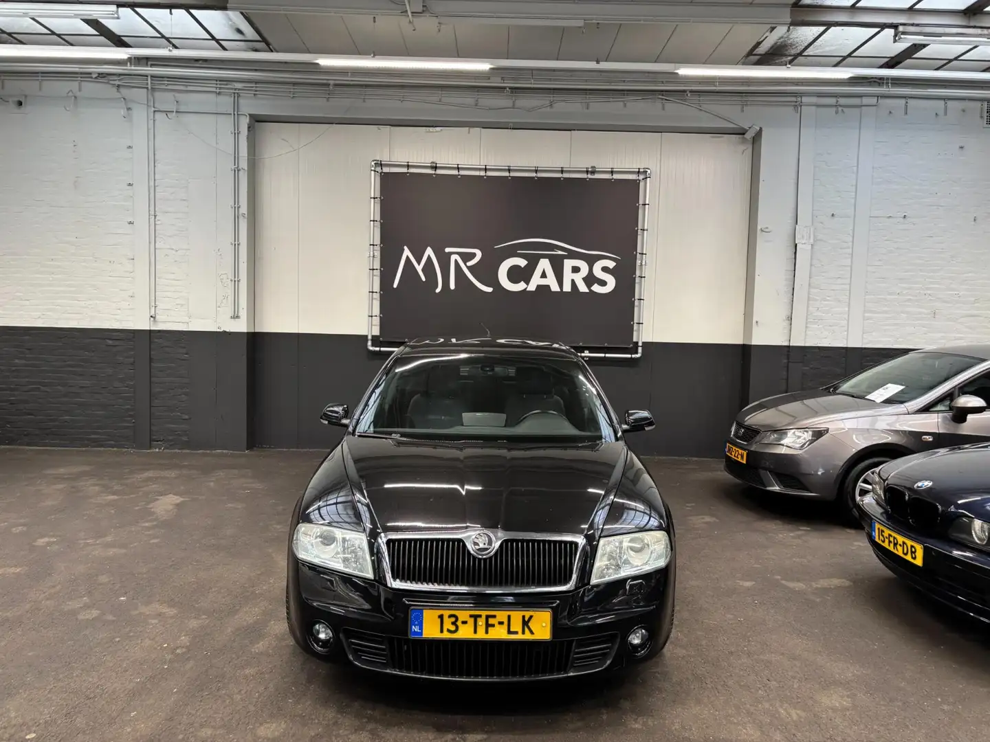 Skoda Octavia 2.0 TFSI RS Airco/Navi/Cruise Control Zwart - 1