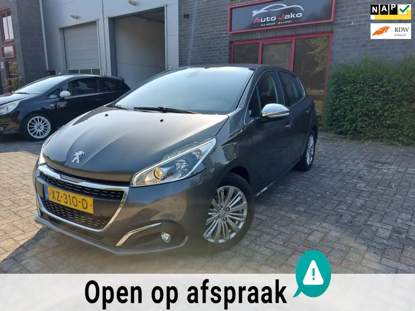 Peugeot 208 1.2 PureTech GT-line/ Nieuwe APK en Onderhoud . 11 Gris - 1