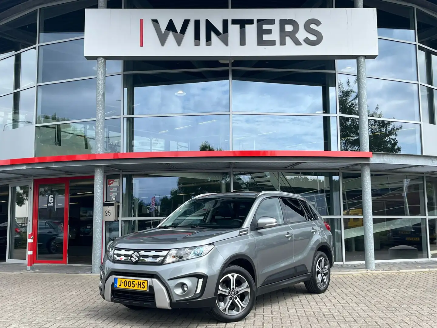 Suzuki Vitara 1.6 High Executive | Navigatie | Camera | Stoelver Grigio - 1