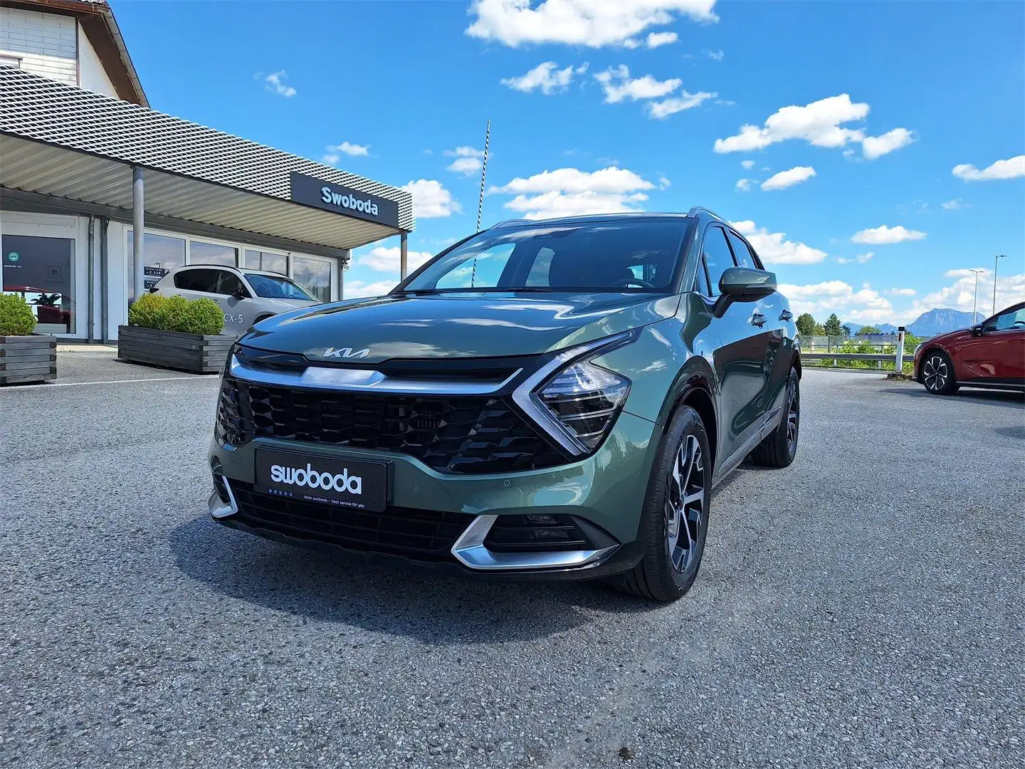 Kia Sportage 1,6 TGDI 48V Gold AWD DCT Grün - 2
