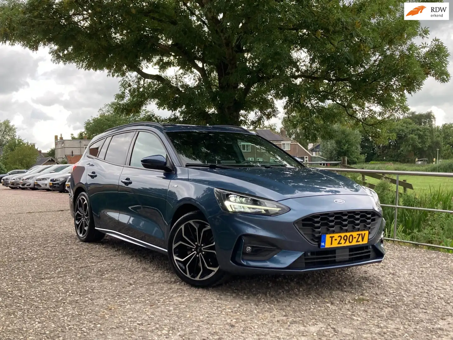 Ford Focus Wagon 1.0 EcoBoost ST-Line | Automaat + Navi + Cru Blauw - 1