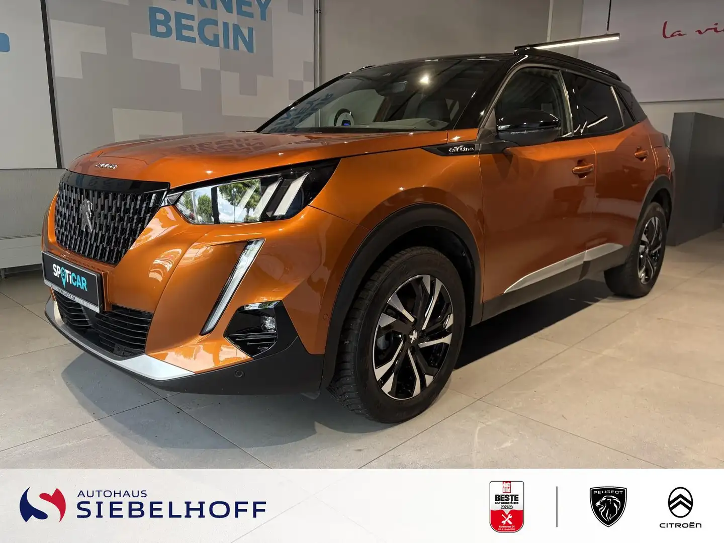 Peugeot 2008 GT-Line PureTech 130 *ParkAssist*CAM* Oranje - 2