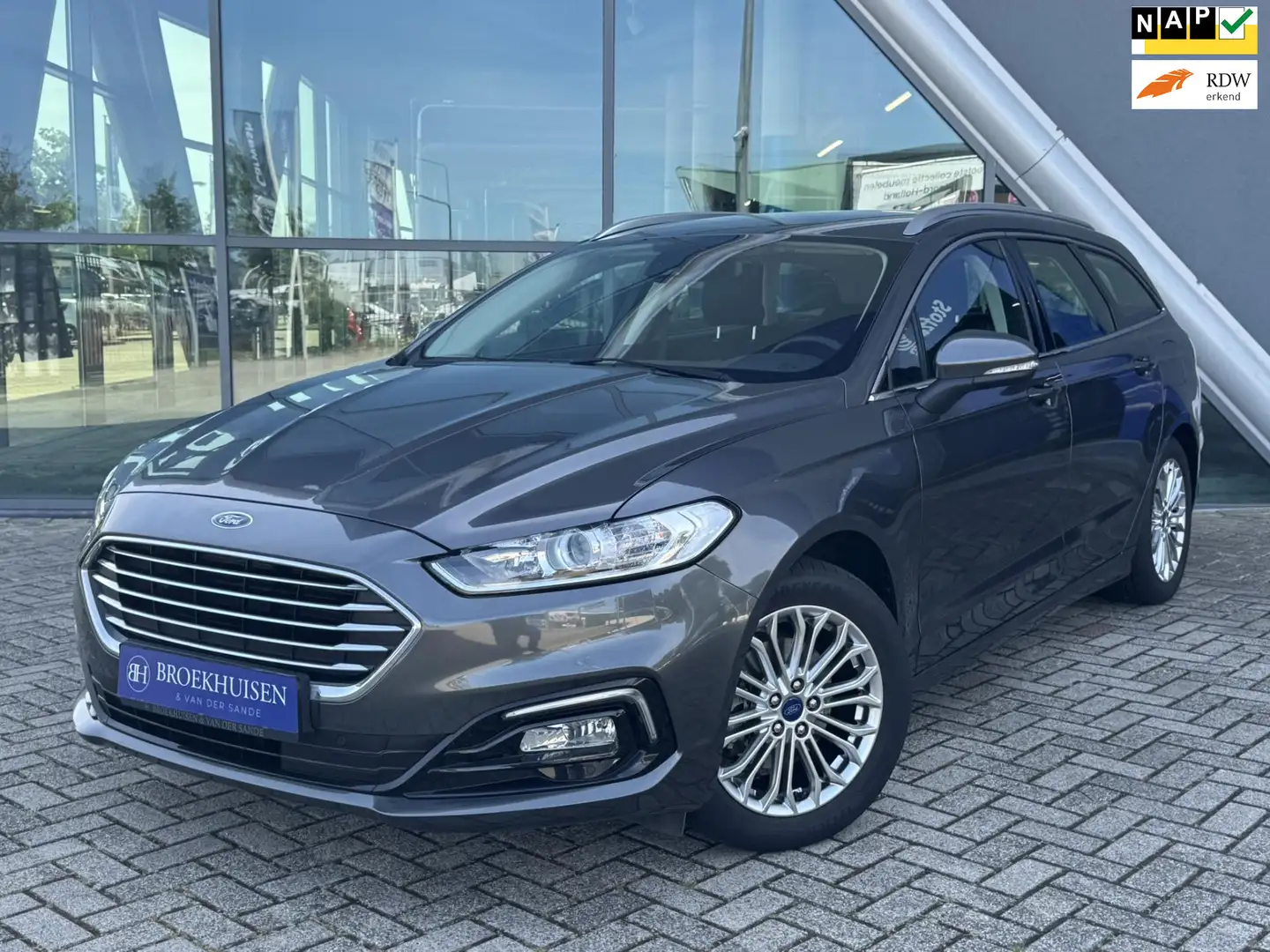 Ford Mondeo Wagon 2.0 IVCT HEV Titanium 191pk Automaat / Stoel Grijs - 1
