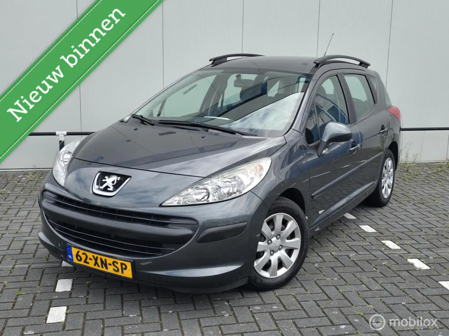 Peugeot 207 SW 1.4 VTi X-line 1e eigenaar! 90DKM! Grijs - 1