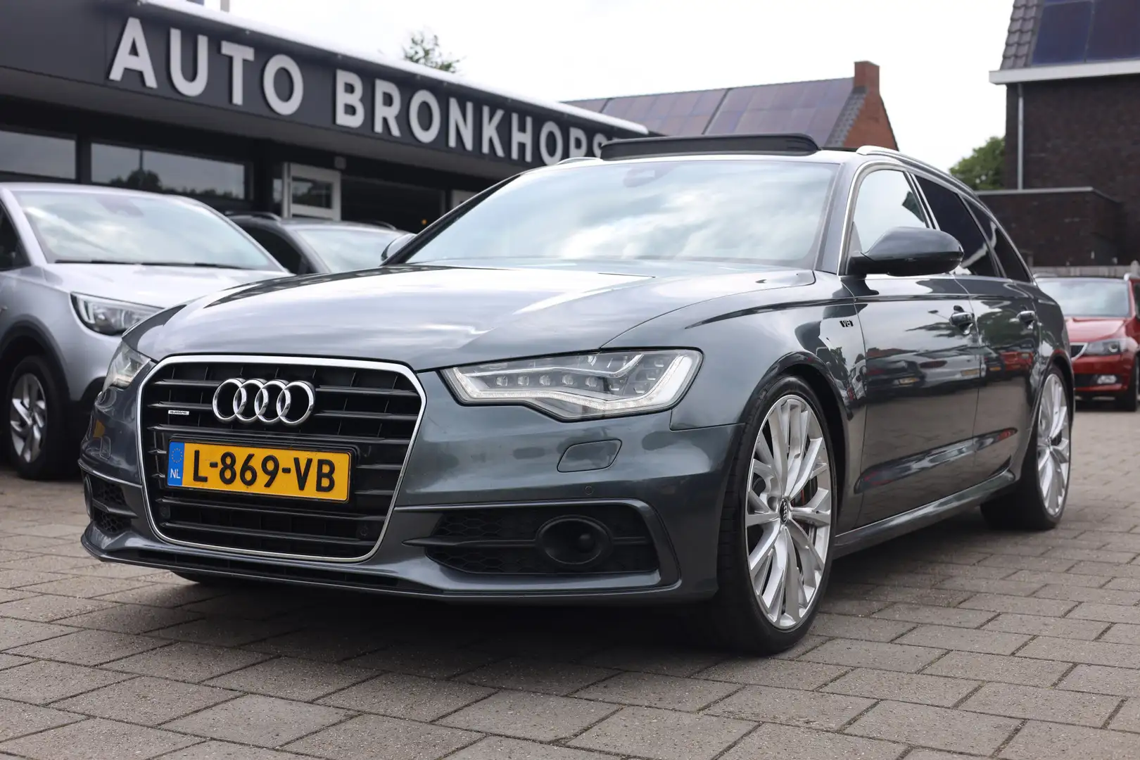Audi A6 Avant 3.0 TDI BiT QUATTRO 3X S-LINE | PANO | 21 IN Grijs - 1